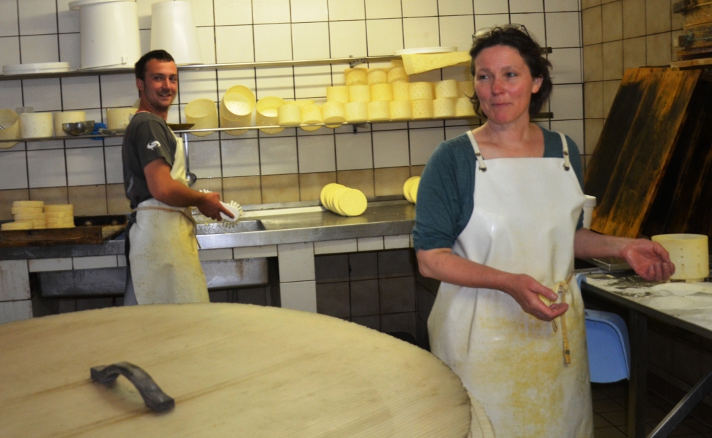 Tow generations of the Baumann family enjoy making specialty Munster cheese